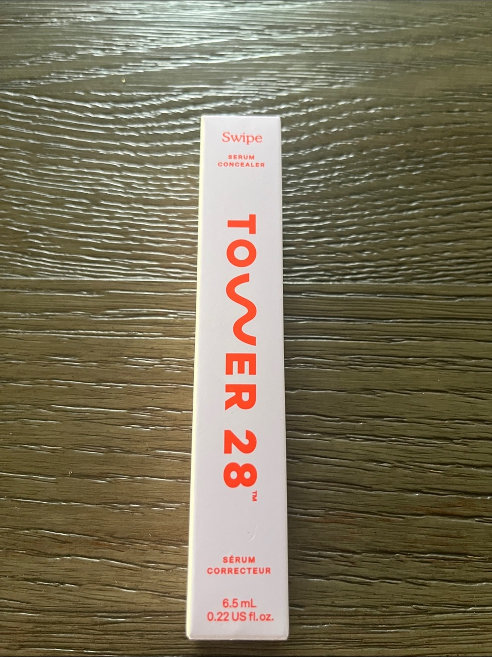 Tower 28 Swipe Serum Concealer - Coral on White